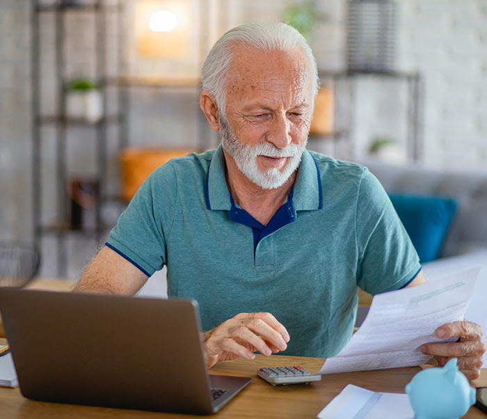senior citizen checking a paper